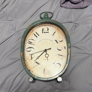 Kirklands Rustic Green Oval Wall Clock